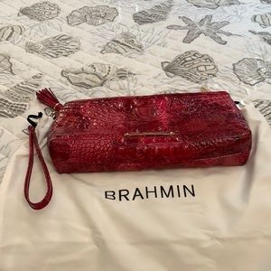 Brahmin wristlet/clutch rose to wine colored